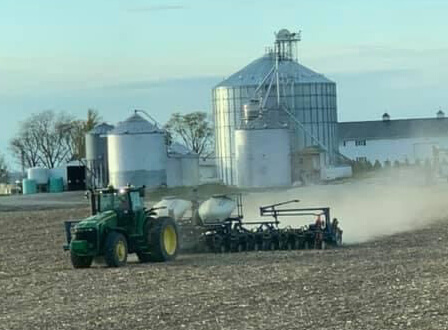 Majors Enterprises tractor working a farm field.